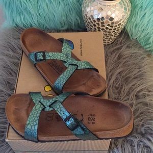 Birki’s Croco Embossed Cross Strap Sandals